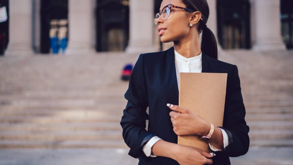 African American female lawyer in stylish formal suit
