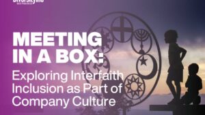 A photo of the cover for Meeting in a Box: Exploring Interfaith Inclusion as a Part of Company Culture. Religions symbols appear in the light of a sunset.